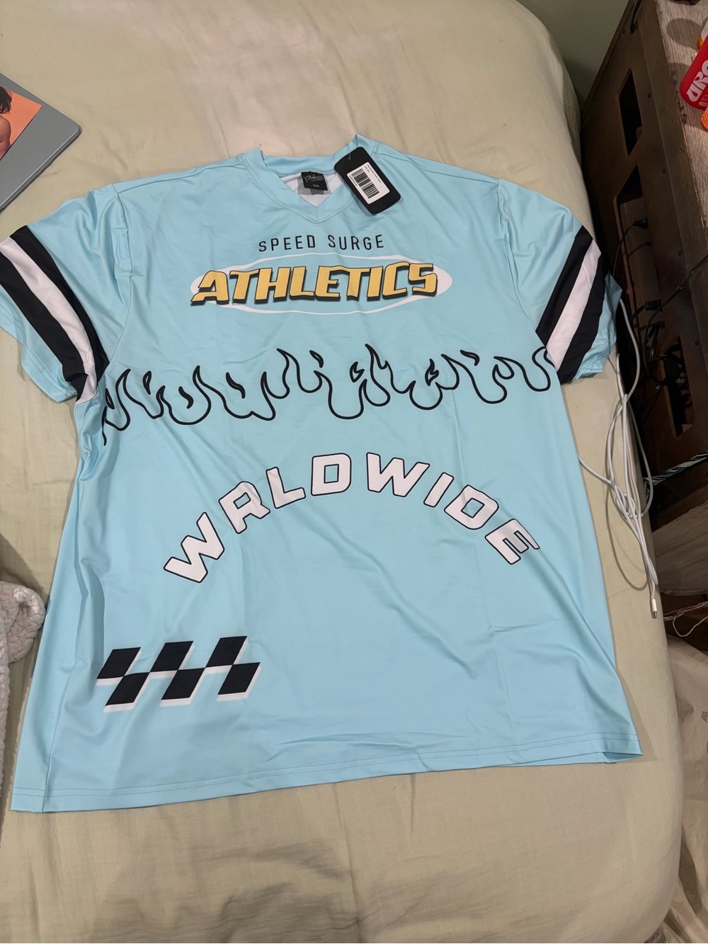 Speed Surge Worldwide Athletics Women's Light Blue Jersey Top